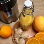 erfrischender Ingwer-Orangen-Shot